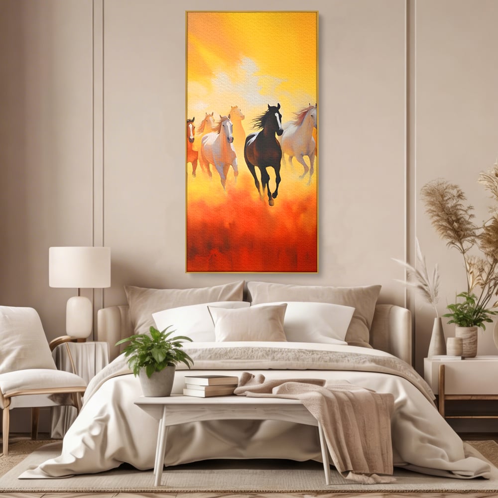 Tablou canvas cu pictura cu cai in galop, in rama de aluminiu auriu, pe perete intr-un dormitor